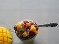 Cottage cheese pudding with spoon on white background.