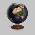 Isolated unmarked atlas globe on a Light Reflective Surface Royalty Free Stock Photo