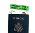 Isolated US passport with virus immunity certificate against white