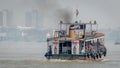 An isolated view of a ferry crossing river Ganges or Ganga
