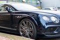 Isolated view of a newly delivered, British built, ionic two door sports car.