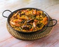 isolated view of paella mixta, typical spanish food,mediterranean gastronomic culture Royalty Free Stock Photo