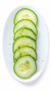 Isolated view of single cucumber slice on white background, plate Royalty Free Stock Photo