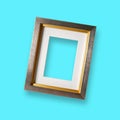Isolated Vintage Empty Picture Gold Wood Frame For Interior Wall Decoration On Light Blue Background