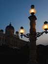 Isolated, vintage street lamp in front of the Natural Museum in Vienna, Austria at sunset