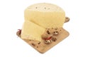 Isolated Walnut cheese on a wooden Board