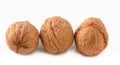 Isolated walnuts on a white background. Three nuts.