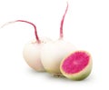 Isolated watermelon radishes. Two whole watermelon radish with a half isolated on white background with clipping path. Royalty Free Stock Photo