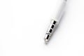 Isolated white aux cable on white background Royalty Free Stock Photo