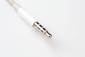 Isolated white aux cable on white background Royalty Free Stock Photo