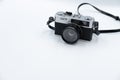 Isolated white background Beautiful vintage analog rangefinder film camera. 70`s Decade film camera. Front left view image copy