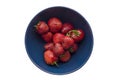 Isolated on white background blue bowl with ripe red strawberries close-up top view Royalty Free Stock Photo