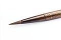 Isolated white background of a Chinese writing brush Royalty Free Stock Photo