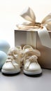 Isolated white composition babys bootees, blank postcard, and a pacifier, perfect gifts