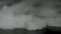  white fog on black background, smoky effect. Stock footage. Blurred smoke clouds overlay on black background.