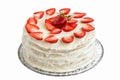 Isolated white strawberry cake covered with eggs whites and gelatin on a tray