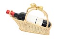 Isolated wine bottle with blank label on basket Royalty Free Stock Photo
