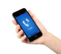 Isolated woman hand holding phone with blue screen and the phone Royalty Free Stock Photo