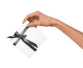 Isolated Woman Hands holding Holiday Present White Box with Grey Ribbon on a White Background