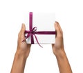 Isolated Woman Hands holding Holiday Present White Box with Pink Ribbon on a White Background Royalty Free Stock Photo