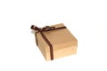 Isolated wooden box whith brown ribbon. Royalty Free Stock Photo