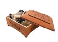 Isolated wooden casket with jewelry. Royalty Free Stock Photo