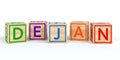 Isolated wooden toy cubes with letters with name dejan