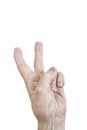 Isolated wrinkled hand of an old person making victory sign on white Royalty Free Stock Photo