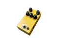 Isolated yellow overdrive, distortion stompbox electric guitar effect for studio and stage performed on white background Royalty Free Stock Photo