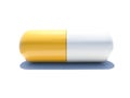 An isolated yellow and white pill