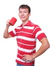 Isolated young man with red coffee cup Royalty Free Stock Photo