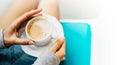 Isolation woman holding in female hands cup of coffee at home, drink cuppuccino in breakfast time in house, mockup copy space Royalty Free Stock Photo