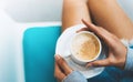 Isolation woman holding in female hands cup of coffee at home, drink hot cuppuccino in breakfast time in house, hipster traveler Royalty Free Stock Photo