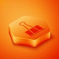 Isometric Binder clip icon isolated on orange background. Paper clip. Orange hexagon button. Vector Illustration Royalty Free Stock Photo