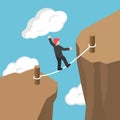 Isometric Businessman Walking and Balancing on Rope Between Cliff Gap Royalty Free Stock Photo