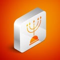 Isometric Hanukkah menorah icon isolated on orange background. Hanukkah traditional symbol. Holiday religion, jewish