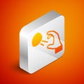 Isometric Hooligan shooting small stones icon isolated on orange background. Demonstrator. Silver square button. Vector