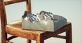 Isometric mountain on wooden chair. Wanderlust and adventure concept