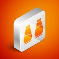 Isometric Salt and pepper icon isolated on orange background. Cooking spices. Silver square button. Vector Illustration