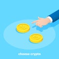 hand points to a bitcoin coin, and next to it is a coin with a dollar sign, the Royalty Free Stock Photo