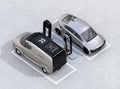 Isometric view of electric minivan and silver sedan charging at charging station