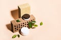 Isometric view of trendy composition made of bricks and Natural cosmetic products in earthy colors