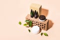 Isometric view of trendy composition made of bricks and Natural cosmetic products in earthy colors