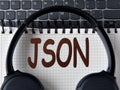 ISON -word on white notepad with keyboard and headphone background Royalty Free Stock Photo