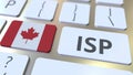 ISP or Internet Service Provider text and flag of Canada on the computer keyboard. National web access service related