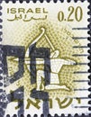 Israel circa 1961: A post stamp printed in Israel showing the symbol Zodiac: Sagittarius - the Archer