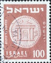 Israel circa 1954: A post stamp printed in Israel showing.a coin with a temple facade