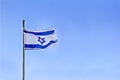 Israel flag on blue sky background Royalty Free Stock Photo