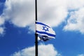 Israel flag hung in honor of the Independence Day of Israel against the blue sky