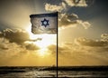 Israel flag waving cloudy sky background sunset